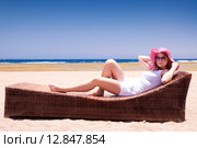 Woman on the lounger. Стоковое фото, фотограф Artur Wojteczek / PantherMedia / Фотобанк Лори