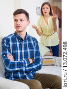 Unpleased person criticizing spouse. Стоковое фото, фотограф Яков Филимонов / Фотобанк Лори
