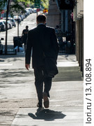 Rear View of a Buinessman walking on a street (2014 год). Стоковое фото, фотограф Keith Levit / Ingram Publishing / Фотобанк Лори