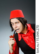 Man wearing red fez hat. Стоковое фото, фотограф Elnur / Фотобанк Лори