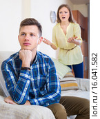 Unpleased person criticizing spouse. Стоковое фото, фотограф Яков Филимонов / Фотобанк Лори