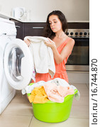 Tired woman near washing machine. Стоковое фото, фотограф Яков Филимонов / Фотобанк Лори