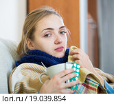 Adult female under blanket with flu attack indoors. Стоковое фото, фотограф Яков Филимонов / Фотобанк Лори