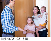 Hospitable householder meeting expected guests. Стоковое фото, фотограф Яков Филимонов / Фотобанк Лори