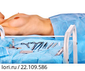 Preparation to breast surgery on instruments background. Стоковое фото, фотограф Gennadiy Poznyakov / Фотобанк Лори