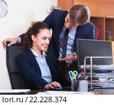 Sexual harassment between colleagues. Стоковое фото, фотограф Яков Филимонов / Фотобанк Лори