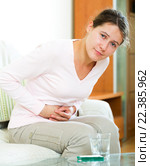 Adult brunette having abdominal pains. Стоковое фото, фотограф Яков Филимонов / Фотобанк Лори
