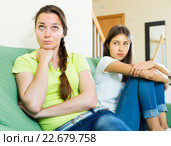 Woman friends sitting and discontent. Стоковое фото, фотограф Яков Филимонов / Фотобанк Лори