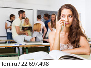 Lonely sad student in the classroom. Стоковое фото, фотограф Яков Филимонов / Фотобанк Лори