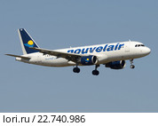 Airbus A320 (бортовой TS-INQ) авиакомпании Nouvelair на посадке в Шереметьеве (2016 год). Редакционное фото, фотограф Alexei Tavix / Фотобанк Лори