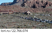 Parador Las Canadas del Teide with parking area is on the TF-24 road near the Roques Garcia in Teide National Park. Roques Garcia, Tenerife, Canary islands, Spain (2016 год). Редакционное видео, видеограф Кекяляйнен Андрей / Фотобанк Лори