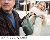 Portrait of frightened mature woman and robber. Стоковое фото, фотограф Яков Филимонов / Фотобанк Лори