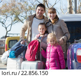 Family with kids with trollers near car. Стоковое фото, фотограф Яков Филимонов / Фотобанк Лори