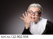 Funny man wearing nun clothing. Стоковое фото, фотограф Elnur / Фотобанк Лори