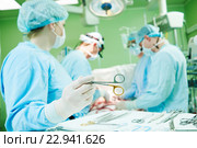 surgeons at work. female nurse operating in child surgery hospital. Стоковое фото, фотограф Дмитрий Калиновский / Фотобанк Лори