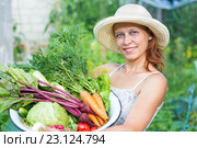 Woman with crop of fresh vegetables. Стоковое фото, фотограф Типляшина Евгения / Фотобанк Лори