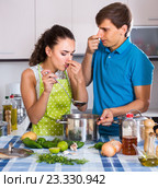 Unhappy couple with stinking veggies food. Стоковое фото, фотограф Яков Филимонов / Фотобанк Лори
