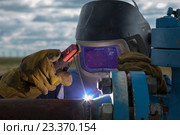 Газоэлектросварщик. Стоковое фото, фотограф Evgenii Mitroshin / Фотобанк Лори