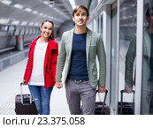 Portrait of couple with wheeled trollers. Стоковое фото, фотограф Яков Филимонов / Фотобанк Лори