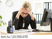 thoughtful business woman analyzing reports in office. Стоковое фото, фотограф Оксана Кузьмина / Фотобанк Лори