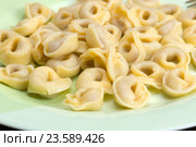 Тортелли́ни (итал. Tortellini) — итальянские пельмени из пресного теста с мясом, сыром или овощами (народн. сленг - "пупок") Стоковое фото, фотограф Леонид Штандель / Фотобанк Лори