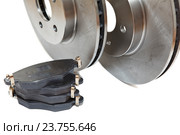 Four brake pads and two new steel ventilated brake disks isolated on white background. Стоковое фото, фотограф Кекяляйнен Андрей / Фотобанк Лори