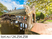 Thanh Toan tile roofted covered bridge, Vietnam (2016 год). Стоковое фото, фотограф Александр Подшивалов / Фотобанк Лори