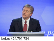 Дмитрий Сергеевич Песков - пресс-секретарь президента Российской Федерации, заместитель руководителя Аппарата Президента на ежегодной пресс-конференции Владимира Путина (2016 год). Редакционное фото, фотограф Игорь Долгов / Фотобанк Лори