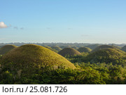 Landscape in Philippines, sunset over the chocolate hills on Bohol Island. Стоковое фото, фотограф Ершов Максим / Фотобанк Лори