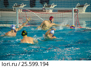 Вратарь Костров Евгений  (1)  в матче Чемпионата России по водному поло Динамо-Москва (белый) - Штурм-2002 (черный) (2016 год). Редакционное фото, фотограф Pukhov K / Фотобанк Лори