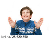 A smiling boy is spanking by hands, isolated on white background. Стоковое фото, фотограф Юлия Кузнецова / Фотобанк Лори
