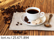 Cup of coffee with cane sugar. Стоковое фото, фотограф Феликс Хромых / Фотобанк Лори