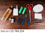Set to vape. Tools, candy, liquid, RDA, RTA. Стоковое фото, фотограф Сергей Лабутин / Фотобанк Лори