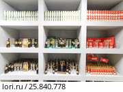 MOSCOW - DECEMBER 2, 2014: cans and bottles of beer on the exhibition stand of the brewery Moscow Brewing Company. Редакционное фото, фотограф Losevsky Pavel / Фотобанк Лори