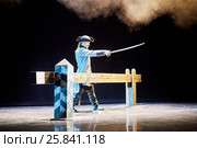 MOSCOW, RUSSIA - JAN 15, 2015: Actor Kirill Scherbina as Kurbsky on stage of Moscow theatre Et Cetera on the day of media preview of Boris Godunov directed by Peter Stein. Редакционное фото, фотограф Losevsky Pavel / Фотобанк Лори
