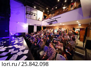 MOSCOW - APR 25, 2015: People wait for performance Saint-Exupery - Towards Stars by letters Consuelo and Antoine de Saint-Exupery, and fragments of Little Prince by Roman Viktyuk in theater of Vysotsky. Редакционное фото, фотограф Losevsky Pavel / Фотобанк Лори