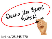 Man Hand writing Quero Um Brasil Melhor! with black marker on visual screen. Стоковое фото, фотограф Плотников Дмитрий / Фотобанк Лори