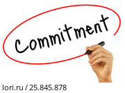 Man Hand writing Commitment with black marker on visual screen. Стоковое фото, фотограф Плотников Дмитрий / Фотобанк Лори
