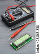 LSD screen wh1602 and multimeter on wooden background. Стоковое фото, фотограф Alexander / Фотобанк Лори