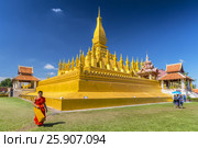 Pha That Luang, symbol of the Laos sovereignty, Buddhist religion and the city of Vientiane, Vientiane, Laos. Редакционное фото, агентство BE&W Photo / Фотобанк Лори