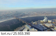 Аэрофотосъемка. Зима. Город Иркутск. Россия. Сибирь. Вид на мост через реку Ангару (2017 год). Стоковое видео, видеограф Виталий Зверев / Фотобанк Лори