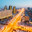 View from above on a large avenue that goes to the horizon, a golden skyscraper and a house of ministries in Astana, Kazakhstan. Стоковое фото, фотограф Андрей Орехов / Фотобанк Лори