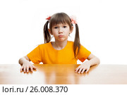 Stubborn little girl at the table. Стоковое фото, фотограф Юлия Кузнецова / Фотобанк Лори