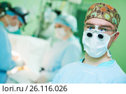male cardiac surgeon at child cardiosurgery operating room. Стоковое фото, фотограф Дмитрий Калиновский / Фотобанк Лори