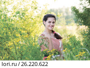 Beautiful Russian girl in thickets of tansy. Стоковое фото, фотограф Володина Ольга / Фотобанк Лори
