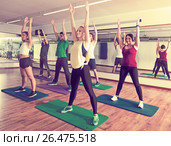 Adults having group fitness class. Стоковое фото, фотограф Яков Филимонов / Фотобанк Лори