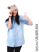 Funny young teenager in hat shows thumb up. Стоковое фото, фотограф Tatjana Romanova / Фотобанк Лори