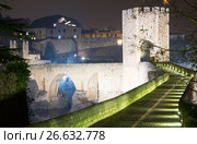 night photo of old medieval stone bridge with gate. Besalu. Стоковое фото, фотограф Яков Филимонов / Фотобанк Лори