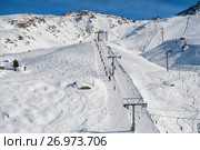 Ski resort in the Swiss Alps. Skiers ascend on rope tow up (2010 год). Стоковое фото, фотограф Юлия Бабкина / Фотобанк Лори