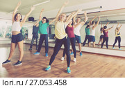 Happy adults having group fitness class. Стоковое фото, фотограф Яков Филимонов / Фотобанк Лори